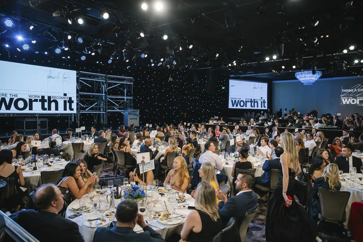 Image of people in a full ballroom for an awards event